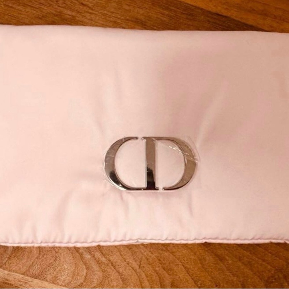 Dior Light Pink puffer pouch with Shiny Silver insignia on front.   GWP